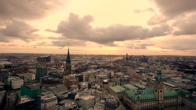 nostalgic static aerial panorama view of downtown Hamburg with town hall, st. nikolai's church, harbor, elbe river and st. michaelis church, 2023
