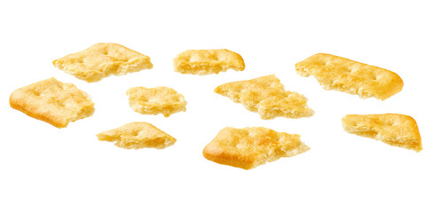 Broken cheese crackers isolated on white background.