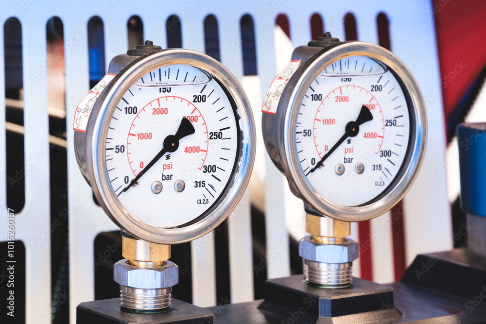 Poster two pressure gauges are next to each other. one of them is showing a reading of 400 psi