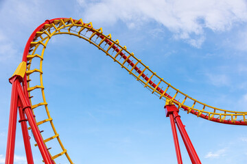 A roller coaster without people at an amusement park