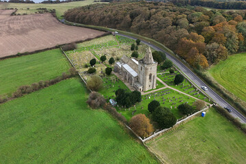 aerial view of Church of St Oswald, Lythe, is the parish church for the village of Lythe on the...