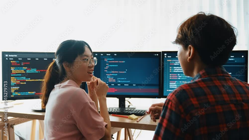 Wall mural slow motion back end software developer engineer for computer programming working together on debugg