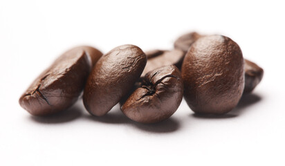 Studio, beans and organic coffee with caffeine, product and closeup of sustainable business cafe. Espresso, grain and fresh roast with flavor, eco friendly and local drink culture on white background