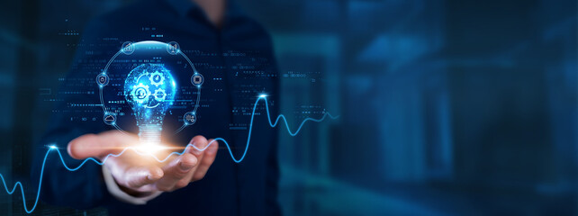 Automation: Businessman hands with light bulb of inspiration, bright idea, and creative thinking energetic on digital network. Efficiency, process optimization, task management, innovation.