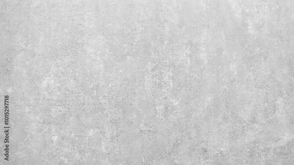 Poster a grey wall with a white spot in the middle. the wall is made of concrete and has a rough texture