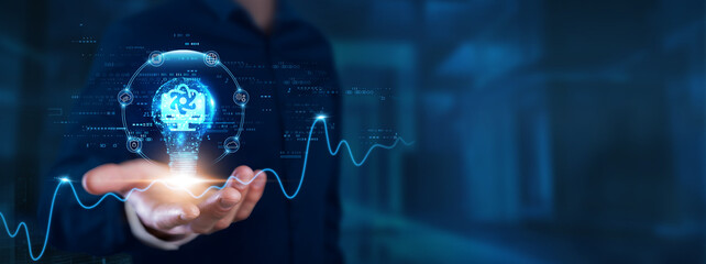 Quantum Computing: Businessman hands with light bulb of inspiration bright idea and creative...