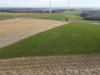 Obraz premium View from above of farm fields in the countryside in spring