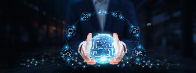 5G Technology: Businessman hands hold global 5G technology, high-speed connectivity, low latency, network efficiency, smart devices, real-time data, internet of things (IoT), digital transformation.