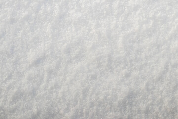 texture of soft fluffy snow in sunny weather