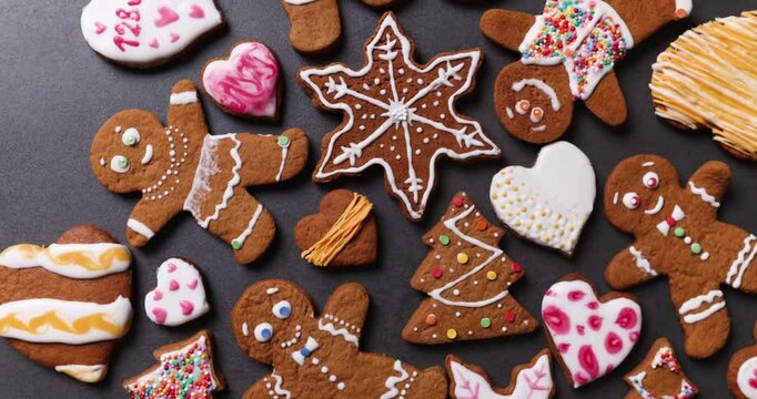 many christmas gingerbread cookies on dark background
