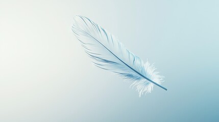 Obraz premium A white feather floats against a blue and white backdrop, with a blurred sky behind it