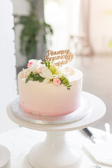 Elegant First Communion Cake with Floral Decoration and Wooden Topper for 