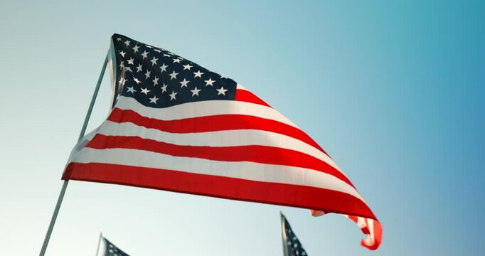 The US flag symbolizes unity and remembrance, showcasing resilience after September 11, while also celebrating freedom on the 4th of July, reminding us of our shared heritage and patriotism
