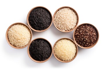 Assorted rice types isolated on white glutinous black basmati brown and red mixed Overhead view