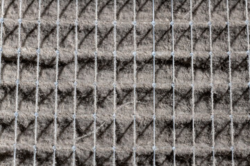 Close up of home air filter showing the dirt and particle cause bacteria inflection and sickness.