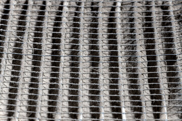 Close up of home air filter showing the dirt and particle cause bacteria inflection and sickness.