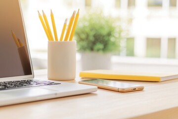 Lunch breaks are spent with computers and mobile phones on the desk