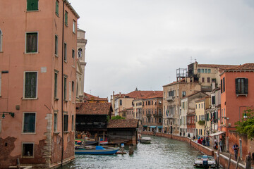 Charming Venetian Canal with Historic Buildings and Boats