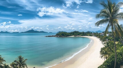 Fototapeta premium A panoramic shot of the white sand beaches of Koh Samui, with palm trees swaying in the breeze and crystal-clear water.