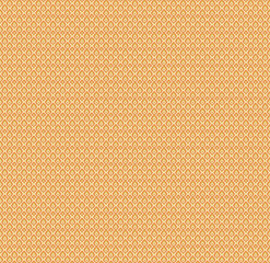 an orange and white background with small squares
