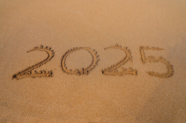 2025 written in the sand