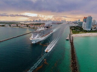 Cruise ship passing through the harbor channel at South Pointe in Miami Beach,  Miami, Florida,...