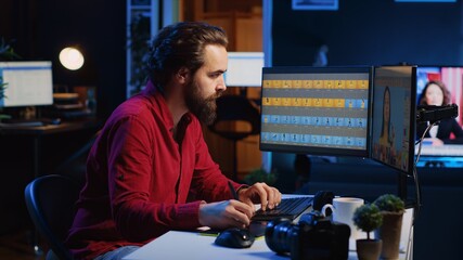 Photo editor retouching photographs with editing software on desktop computer, browsing through photoshoot stills to find images that need correcting. Photographer in home office adjusting images