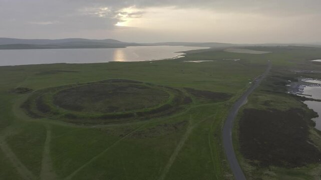 Ring of Brodgar, stone circle and ditch, Neolithic monument, UNESCO World Heritage Site, drone shot from outside the site, Mainland, Orkney Island, Scotland, Great Britain