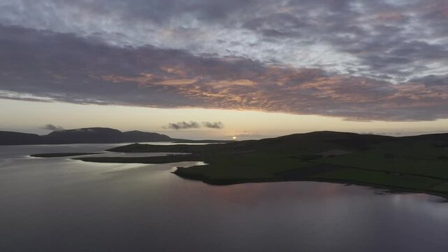 Sunset with view to the island of Hoy, drone shot, Bay of Orphir, Scapa Flow, Orkney, Scotland, Great Britain