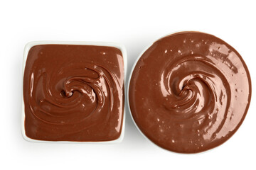 Bowls of tasty melted chocolate on white background