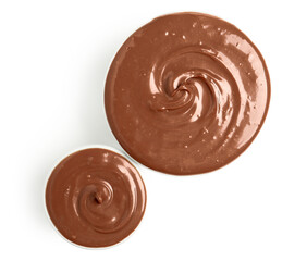 Bowls of tasty melted chocolate on white background