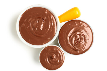 Bowls of tasty melted chocolate on white background