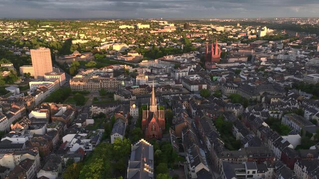 Aerial Drone Shot of Wiesbaden, Germany With Cathedral and Church. Marktkirche in Old town and city center at Evening