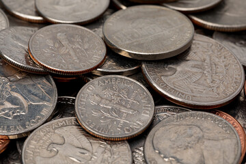 Pile of old coins. Spare change, tipping, and financial planning concept.