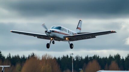Obraz premium Single Engine Small Airplane Takes Flight from Airport with Dramatic Cloudy Sky Backdrop Capturing Adventure and Aviation Spirit in Travel Photography