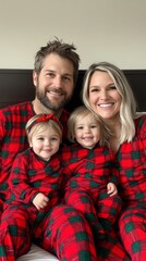 Obraz premium Family in matching holiday pajamas, joyful expressions and cozy atmosphere.