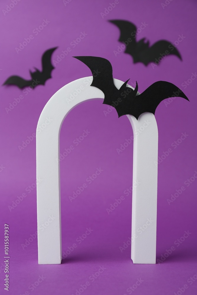 Sticker Halloween celebration. Arc and paper bats on purple background, space for text