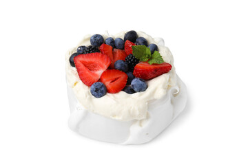 Pavlova cake (meringue dessert) with whipped cream, fresh berries and mint isolated on white