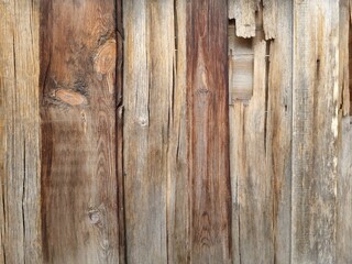 Fototapeta premium Wooden background. Old wooden fence boards close up