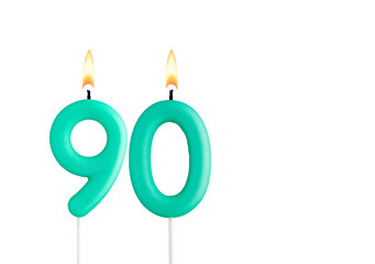 Green birthday candle on white background - Candle number 90