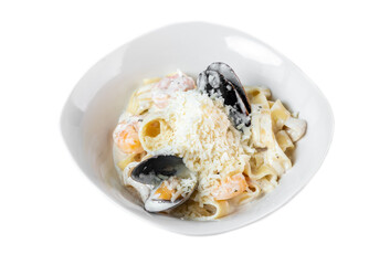 Pasta carbonara with sea food in white plate isolated on white background side view