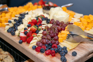 Graze Board. The board includes a variety of cheeses, fruits, vegetables, dips and crackers.	
