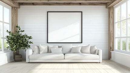Bright and airy living room with a cozy sofa, large windows, and empty frame ready for artwork.