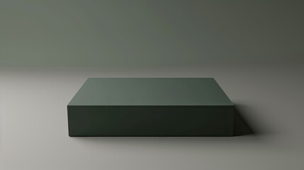 Fototapeta premium Dark green box, matte finish, on a gray gradient background, direct light highlights its edges.