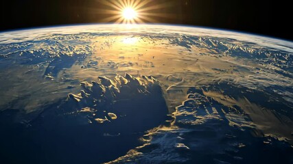 A breathtaking view of Earth from space, with the sun rising over the horizon and illuminating the clouds