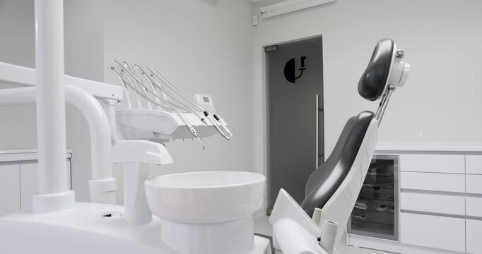 Modern Dental office. Concept of dental care. Modern dental practice. Dental chair and other accessories. 