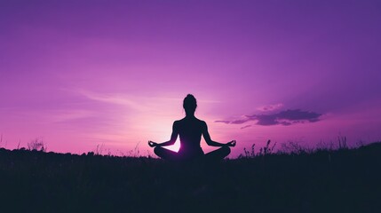 Silhouette of a Woman Meditating at Sunset