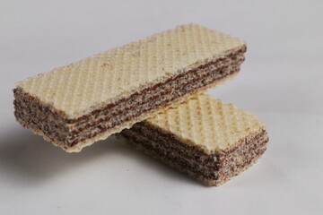 Chocolate flavored wafer biscuits, isolated on a white background.