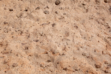 Close up detail of the surface of conglomerate rock