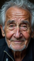 Close-up portrait of elderly man with expressive wrinkles